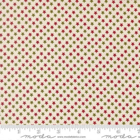 a fabric with a repeating pattern of red and green stars on a beige background.