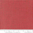 a close-up view of a red and white checkered pattern, with a ruler for scale at the bottom.
