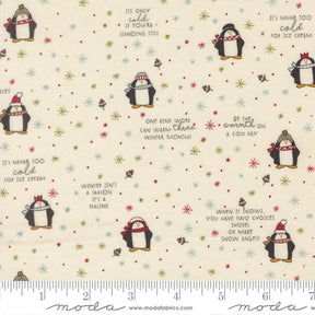 a white fabric with penguins and snowflakes