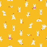 a repeating pattern of white rabbits against a bright yellow background. The rabbits are depicted in various poses, such as standing, sitting, and interacting with objects like carrots and books. The overall composition is simple and visually engaging, with the rabbits being the central focus of the image.