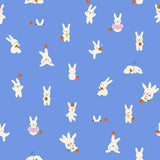 a repeating pattern of white rabbits against a blue background. The rabbits are depicted in various poses, such as standing, sitting, and interacting with objects like carrots and books. The overall composition is simple and visually engaging, with the rabbits and their surroundings creating a sense of movement and energy.