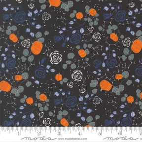 The image is a fabric with a floral pattern featuring orange pumpkins, blue roses, and gray leaves against a dark background.