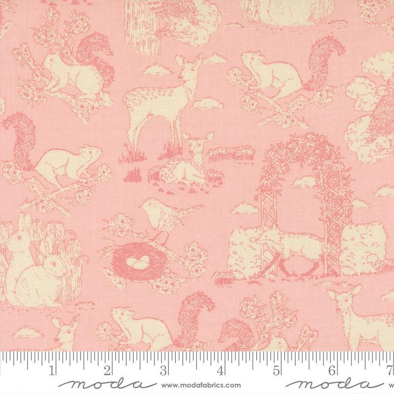 The image is a fabric with a repeating pattern of various animals, including deer, birds, and squirrels, against a pink background.