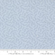 a fabric with a repeating pattern of light blue leaves or branches, creating a textured and leafy appearance.
