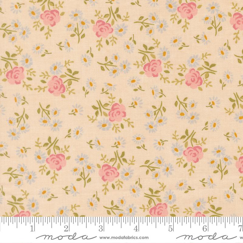 The image is a fabric with a floral pattern, featuring pink roses and white daisies. The pattern is repeated across the fabric, creating a visually appealing and harmonious design.