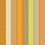 a collection of nine vertical stripes in various colors, including orange, yellow, green, and brown. The stripes have different patterns and designs, creating a visually interesting and diverse arrangement.
