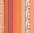 a collection of nine vertical stripes in various shades of orange, pink, and white, arranged in a grid-like pattern.