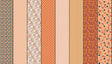 a collection of nine vertical stripes, each with a unique pattern and color. The stripes vary in size and orientation, creating a visually interesting and diverse display.