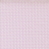 The image is a repeating pattern of small purple flowers or dots on a light-colored background.