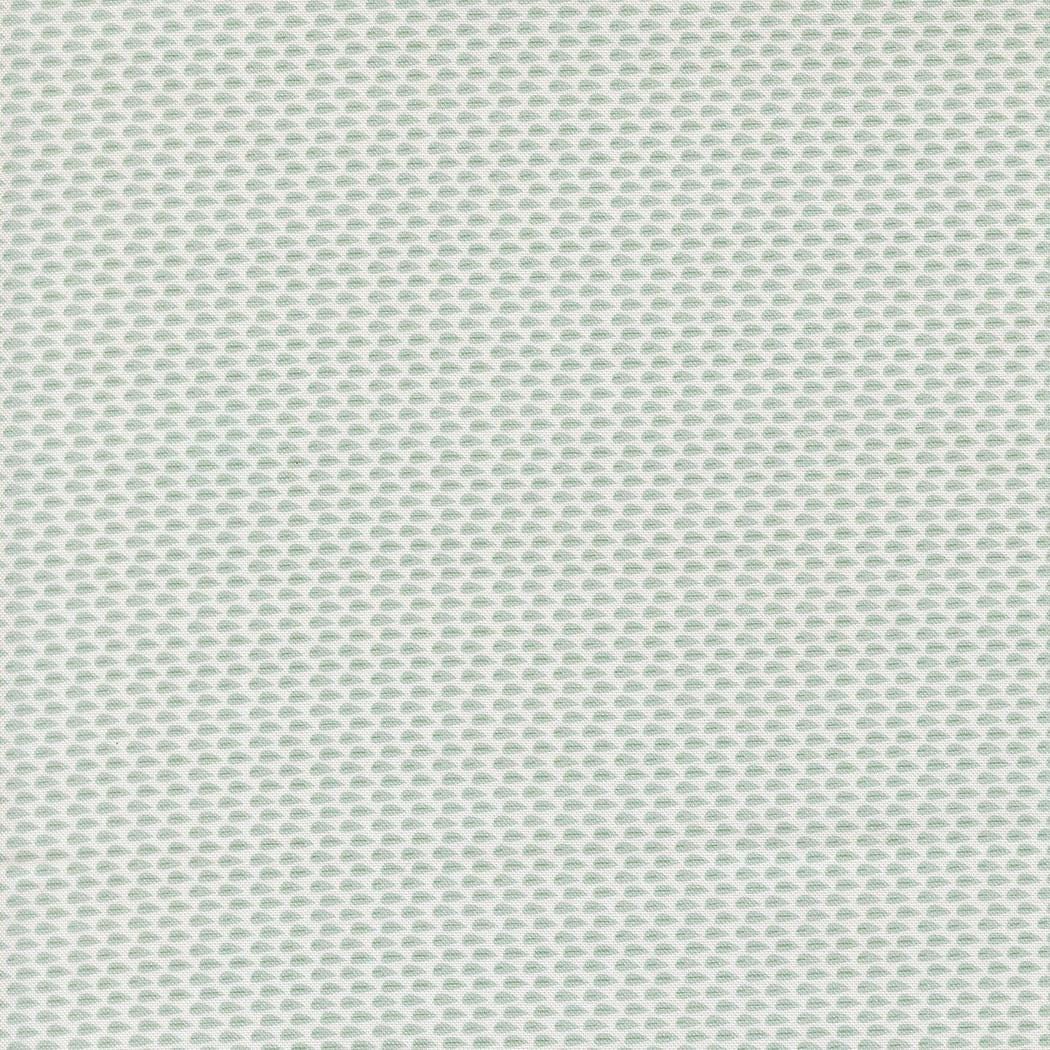 a repeating pattern of small green circles or dots arranged in a grid-like fashion.