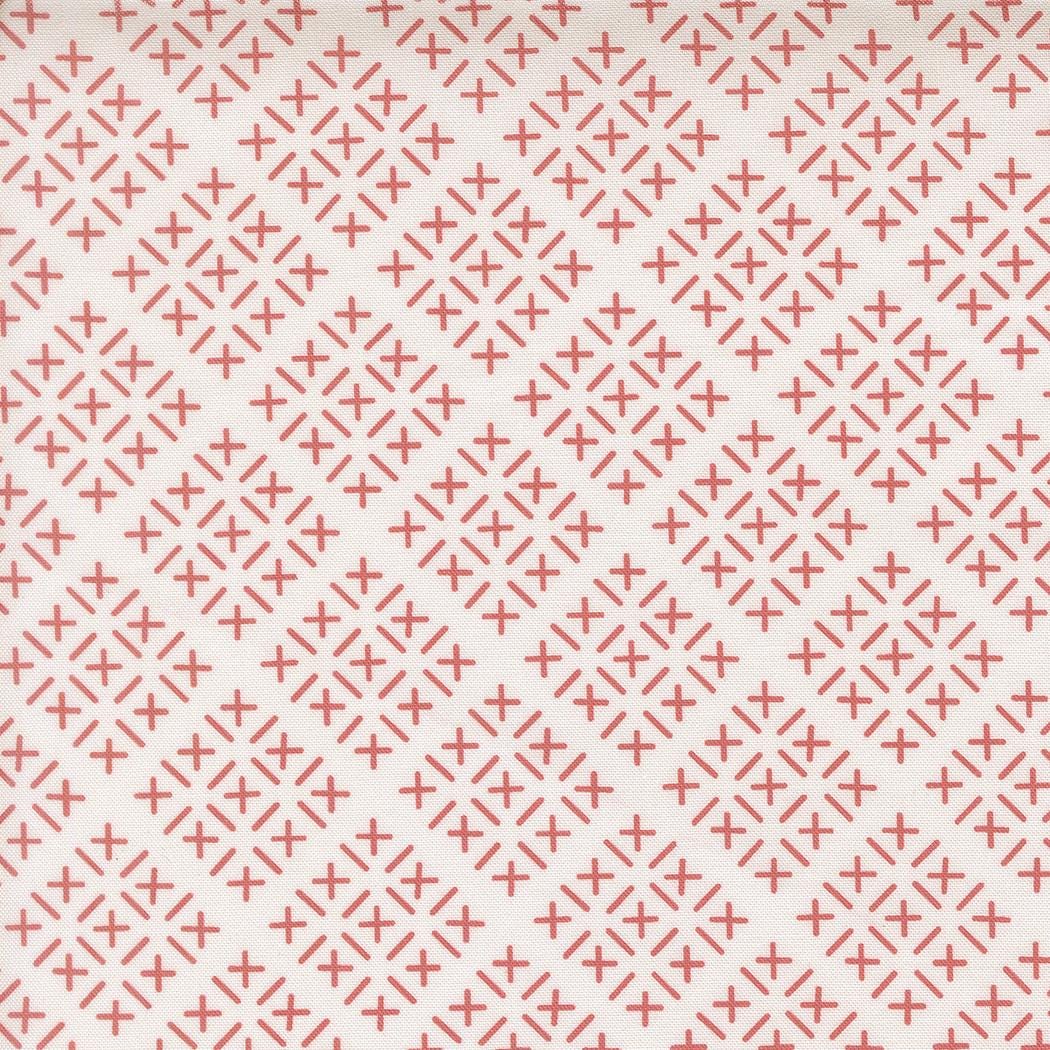 a repeating pattern of red crosses on a white background.