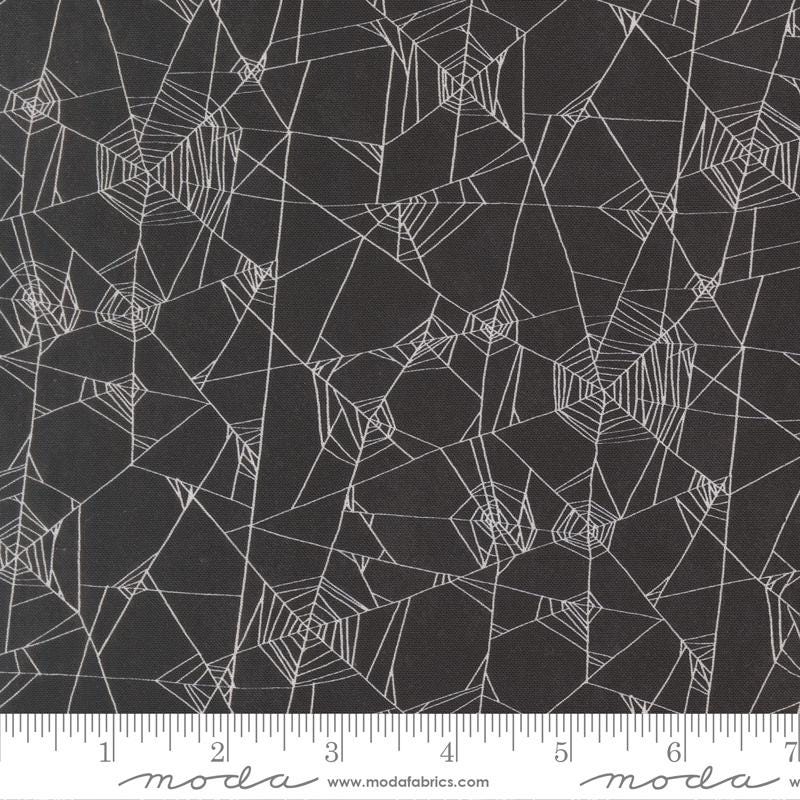 a dark grey background with a repeating pattern of white spider web lines.