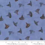 a repeating pattern of witch hats in various shades of blue against a dark blue background.