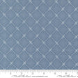 The image is a close-up of a fabric with a diamond pattern, featuring a repeating diagonal grid of small white dots or lines.