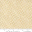 The image is a fabric with a repeating pattern of small yellow flowers or leaves.