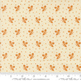 a repeating pattern of orange acorns on a cream-colored background.