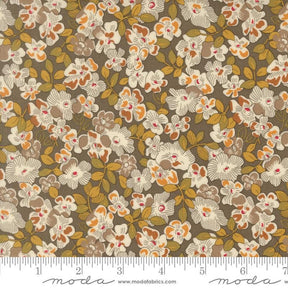 The image is a close-up of a fabric with a floral pattern, featuring various shades of brown and orange flowers and leaves.
