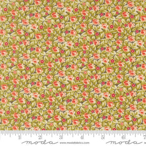 The image is a close-up of a fabric with a floral pattern, featuring small red flowers and green leaves. The fabric appears to be a type of cotton or linen material, with a repeating pattern of flowers and leaves. The image does not contain any text or other discernible objects or actions.