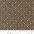 The image is a close-up of a brown fabric with a diamond pattern, featuring small white dots arranged in a repeating diamond shape.