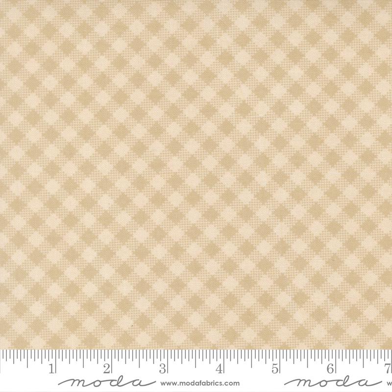 The image is a fabric with a repeating pattern of small squares in various shades of beige.
