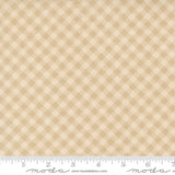 The image is a fabric with a repeating pattern of small squares in various shades of beige.