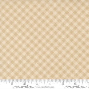 The image is a fabric with a repeating pattern of small squares in various shades of beige.