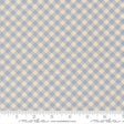 a fabric with a blue and beige checkered pattern. The fabric appears to be a light blue color, and the pattern consists of small squares or rectangles arranged in a diagonal grid-like pattern. The fabric is laid out flat, and there is a ruler visible at the bottom of the image.