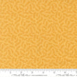 a fabric with a repeating pattern of yellow leaves on a yellow background.