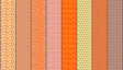 a collection of nine vertical stripes in various shades of orange, yellow, and brown, arranged in a grid-like pattern.