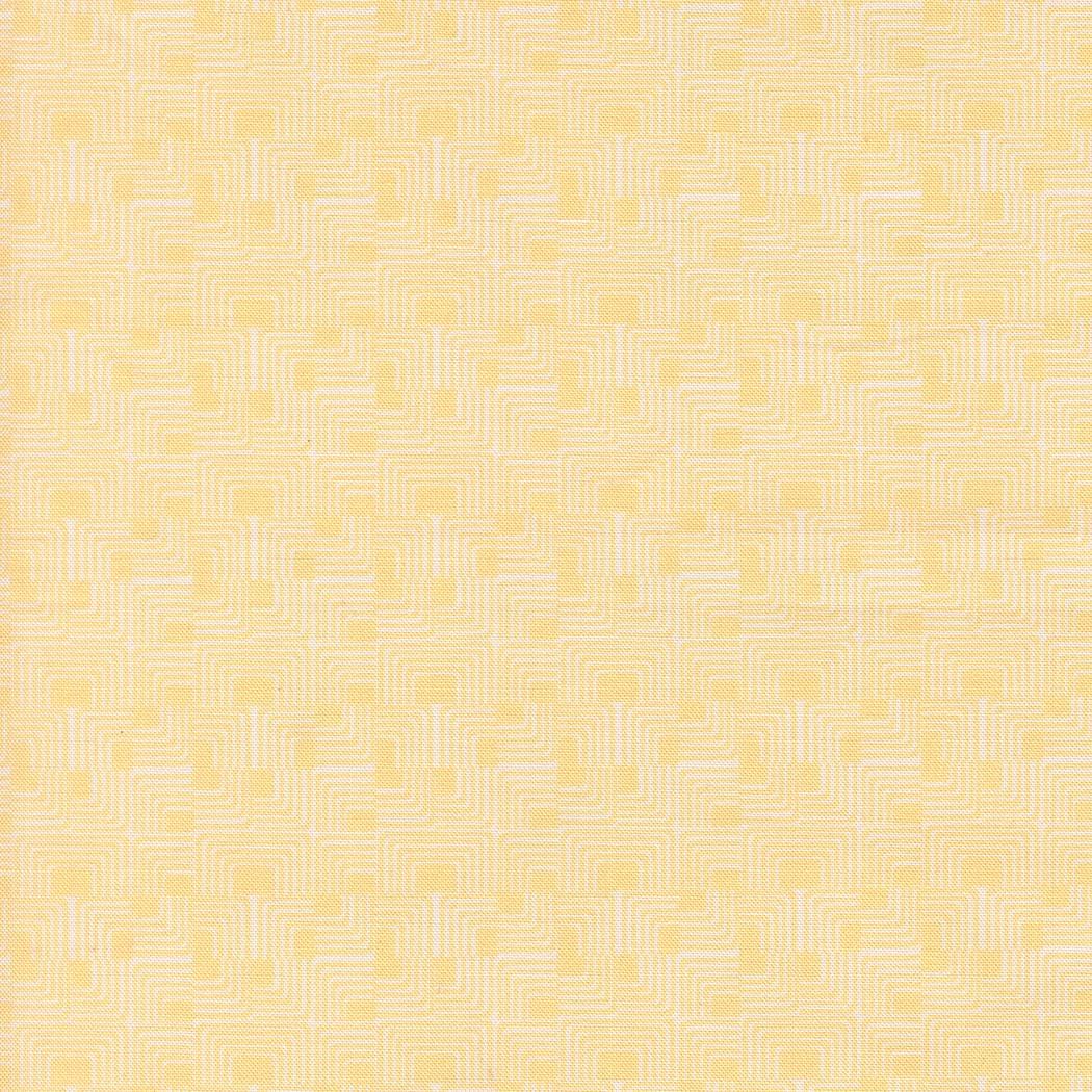 a repeating pattern of yellow and white squares, creating a visually striking and symmetrical design.