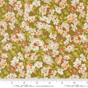 The image is a close-up of a fabric with a floral pattern, featuring various shades of green, brown, and white flowers and leaves.