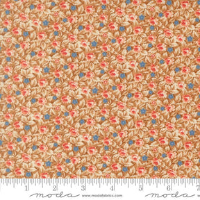 The image is a close-up of a fabric with a floral pattern in shades of brown and orange, with small blue flowers scattered throughout.