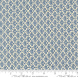 a fabric with a repeating pattern of blue and white flowers or leaves. The pattern is arranged in a diagonal grid-like design, creating a visually appealing and intricate pattern.