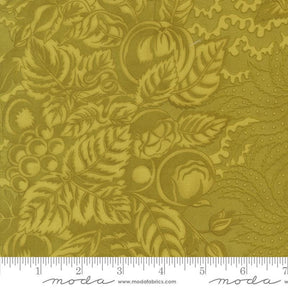 The image is a close-up of a fabric with a repeating pattern of leaves and flowers in a gold color.