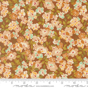 The image is a close-up of a fabric with a floral pattern, featuring a variety of flowers in shades of brown, orange, and green.