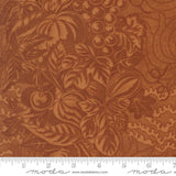 The image is a close-up of a fabric with a detailed brown and orange floral pattern.