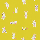 a repeating pattern of cartoon rabbits wearing headphones and holding small objects, such as a pink heart or a pink phone, against a yellow background.