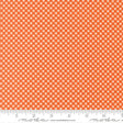 a repeating pattern of orange and white checkered squares on a fabric surface.