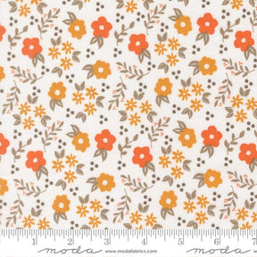 The image is a fabric with a repeating pattern of orange and yellow flowers and leaves on a white background.