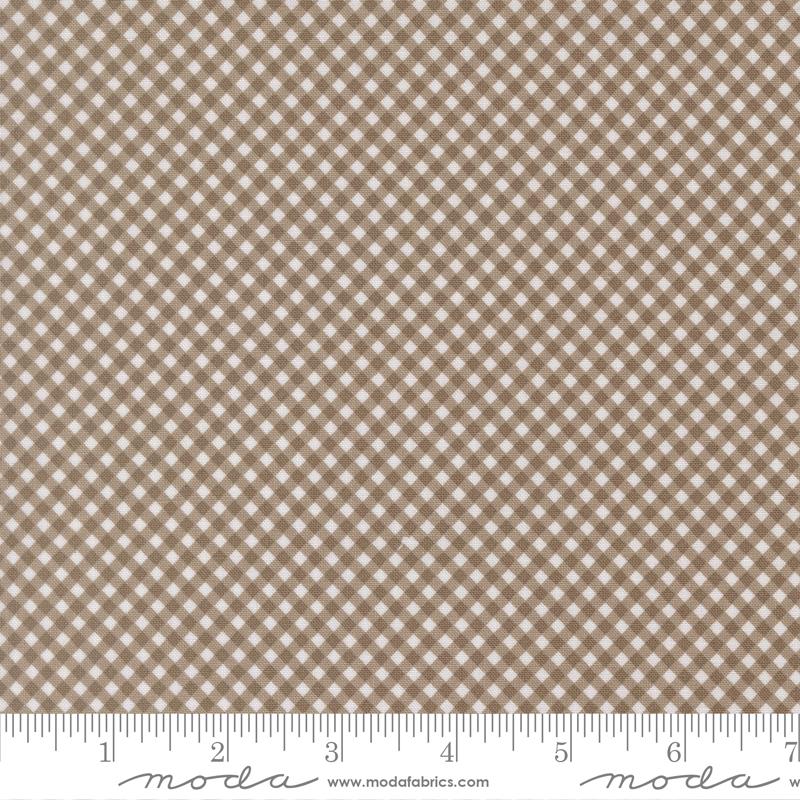 a close-up view of a fabric with a brown and white checkered pattern. The fabric appears to be made of a material with a grid-like texture, which creates a visually appealing and textured appearance.
