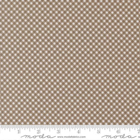 a close-up view of a fabric with a brown and white checkered pattern. The fabric appears to be made of a material with a grid-like texture, which creates a visually appealing and textured appearance.