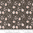 a repeating pattern of white flowers with orange centers against a dark brown background.