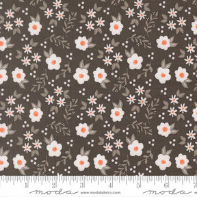 a repeating pattern of white flowers with orange centers against a dark brown background.
