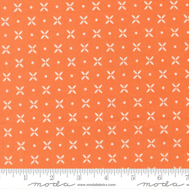 a repeating pattern of white flower-like shapes on an orange background.