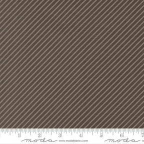 The image is a close-up of a brown fabric with diagonal stripes.