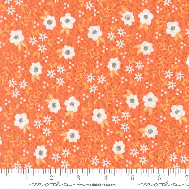 a repeating pattern of white flowers with orange leaves on an orange background.