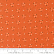 The image is a fabric with a repeating pattern of orange flowers and white stars on it. The pattern is evenly spaced and covers the entire fabric.