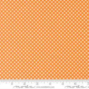 a repeating pattern of orange and white squares, creating a checkered or gingham-like design.