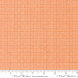 The image is a close-up of a fabric with a repeating pattern of orange squares arranged in a grid-like fashion.