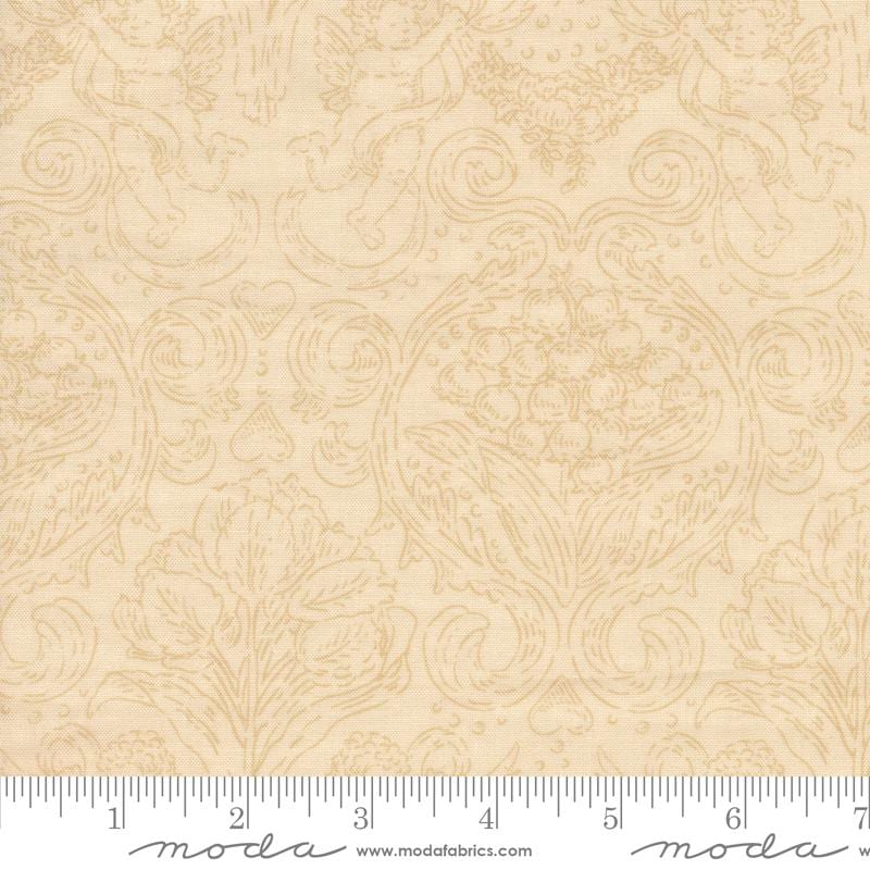The image is a fabric with a repeating pattern of cherubs and flowers, with a ruler for scale.